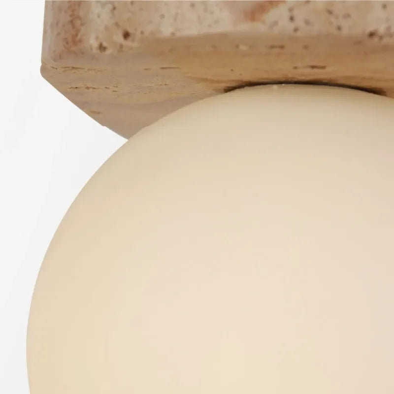 Wabi-Sabi Stone Wall Lamp – Minimalist Bedside Sconce
