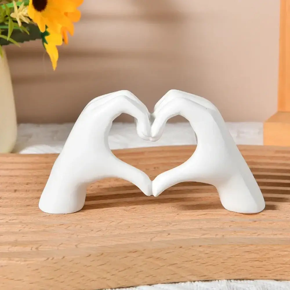 Modern Gold Heart Hand Statue